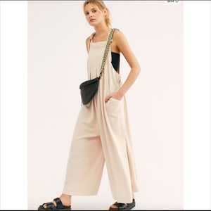 Chic, comfortable long cream jumpsuit 100% cotton.